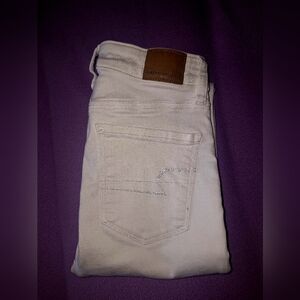 American Eagle Outfitters Men’s White Slim Jeans with Leather Patch